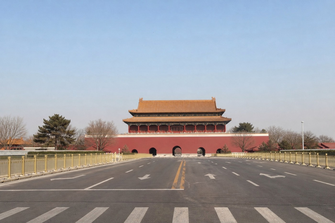 Visitors walking north across Tiananmen Square toward the red walls of the Forbidden City