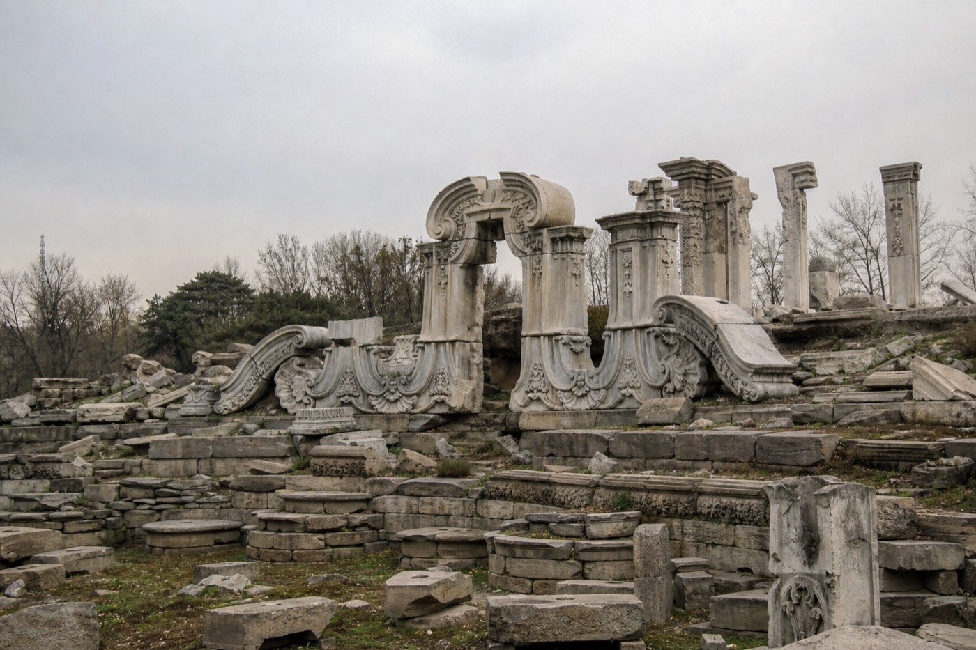 The weathered stone ruins of the Old Summer Palace, Yuanmingyuan, on the outskirts of Beijing